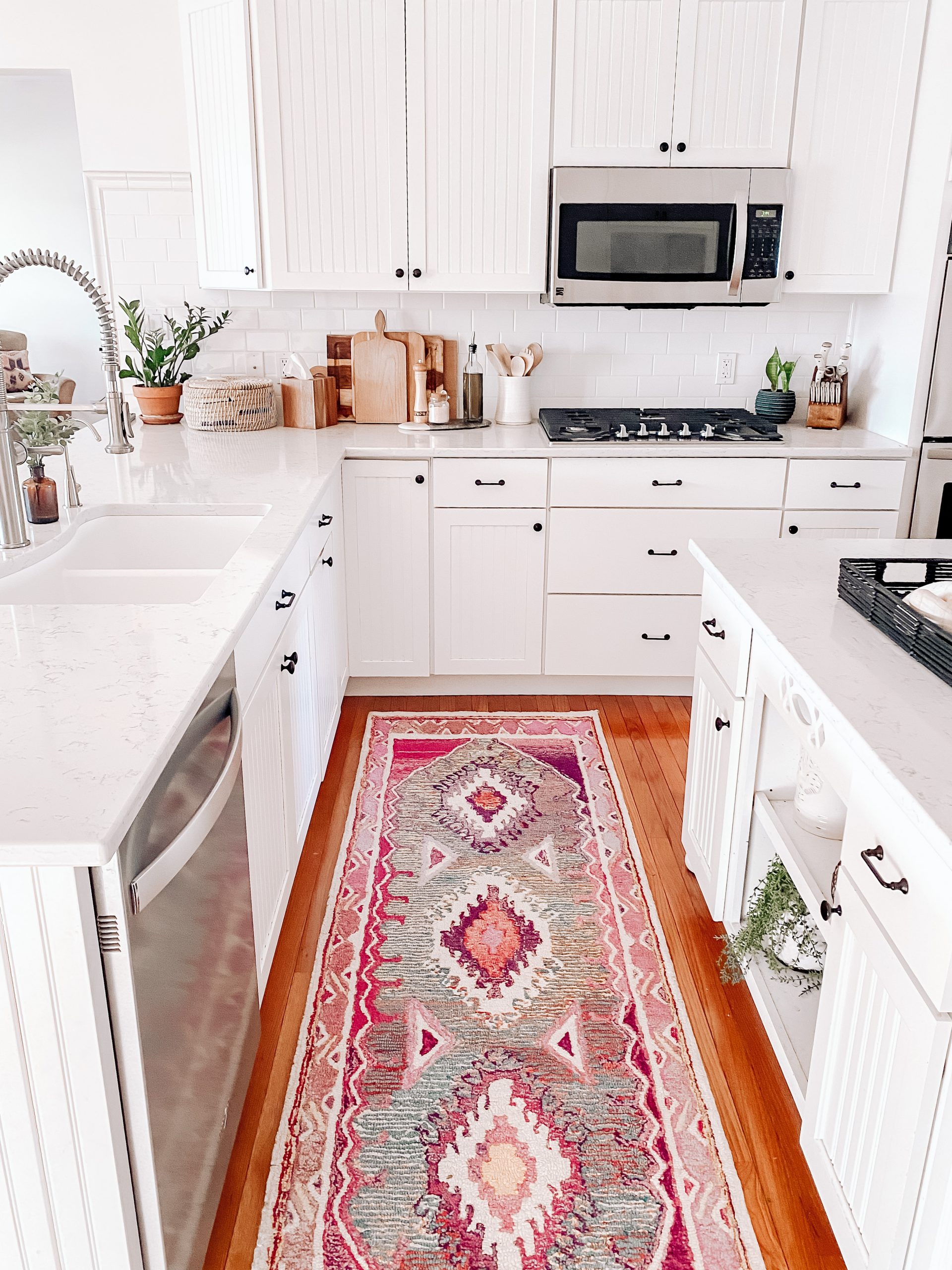https://www.rugsusa.com/blog/wp-content/uploads/2021/06/best-pink-rug-for-kitchen-scaled.jpeg